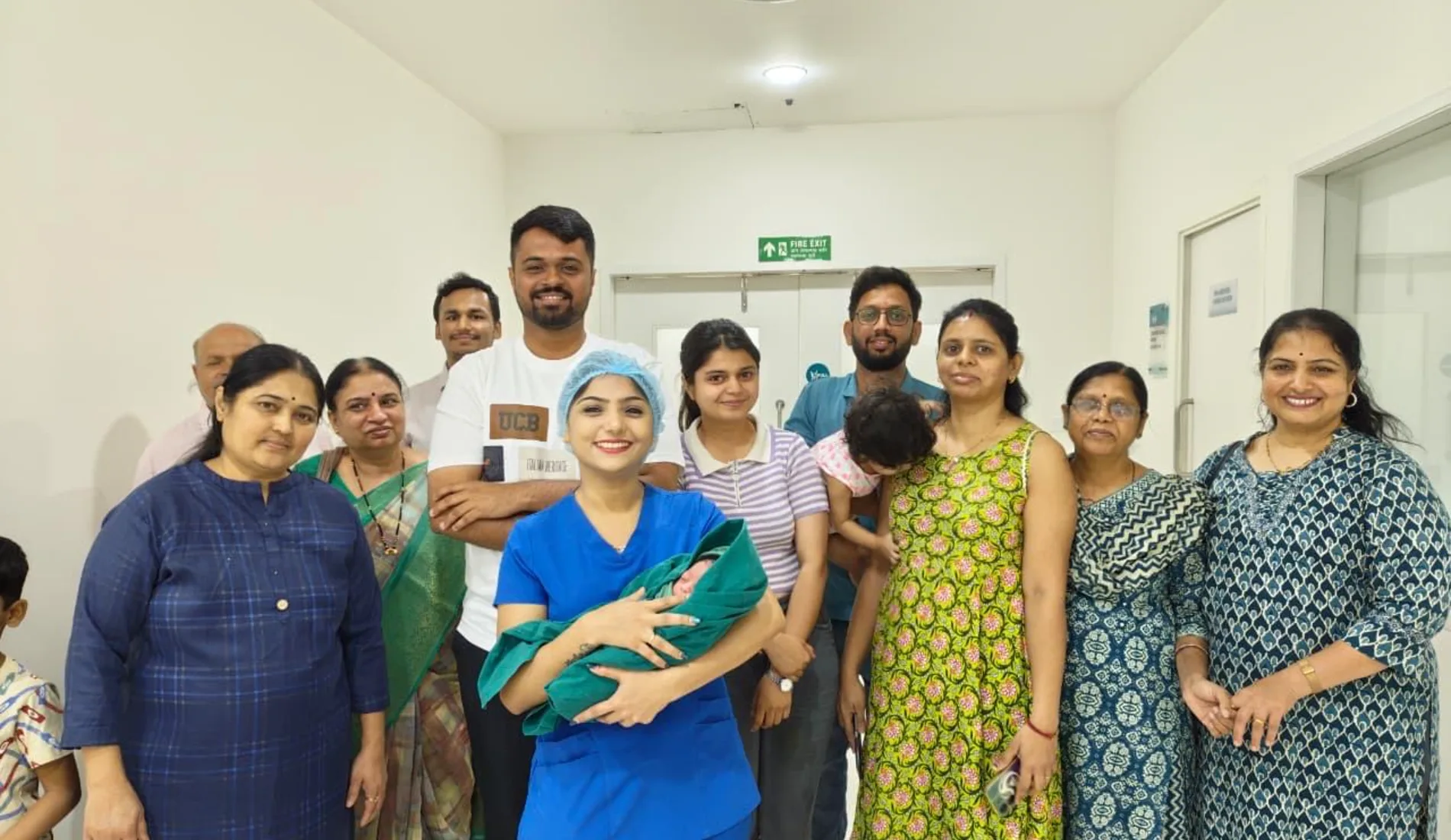 Dr. Rashmi Bhamare with her team and a family at the centre in Baner